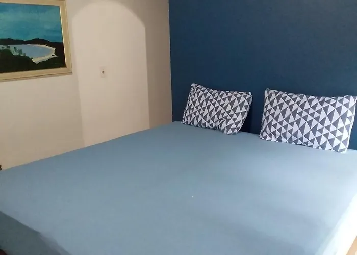 Suites próximo ao rio Jaguareguava em Bertioga